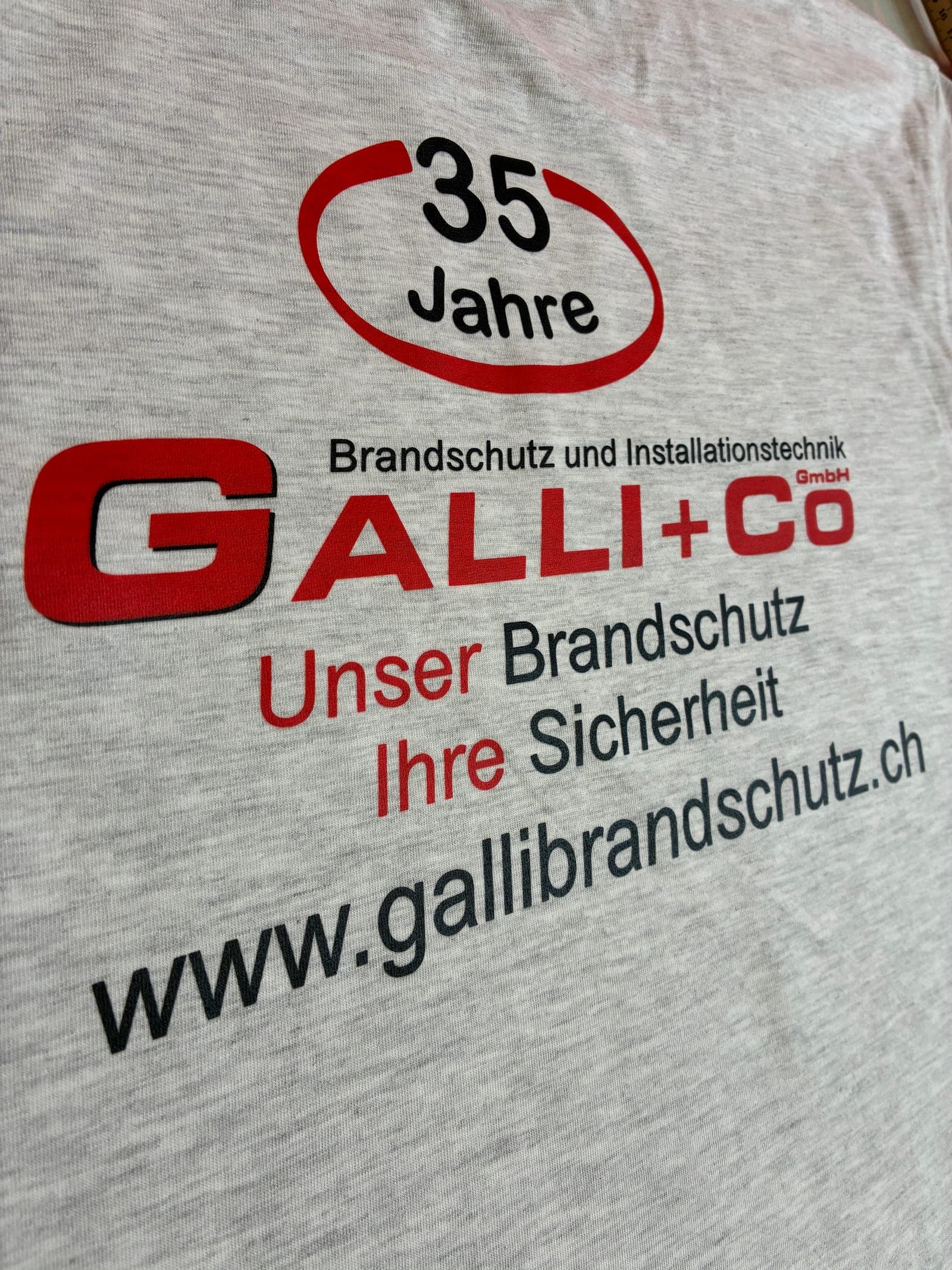 Textildruck mit Firmenlogo auf Textil, Textildruck Graubünden